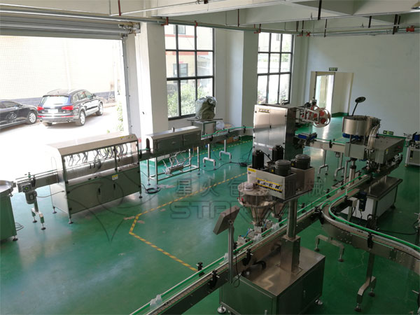 >自動化獸藥灌裝機生產線實拍圖